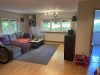 Gemütliche Kapitalanlage im Untergeschoss eines 7 Familienhauses mit Balkon - Wohnzimmer