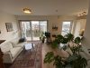 Moderne, hochwertige und vermietete ETW im FlinCarré in Düsseldorf / Flingern - Wohnzimmer Richtung Balkon