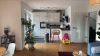 Moderne Maisonettewohnung mit 2 Balkonen und Stellplatz in Münster - Wohnzimmer Richtung Küche