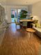Schicke Erdgeschosswohnung mit Terrasse, Garten und Stellplatz als Kapitalanlage - Wohnzimmer Richtung Terrasse
