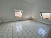Charmante DG-Wohnung mit Spitzboden und Garage – ideal zur Eigennutzung oder Kapitalanlage - Wohnzimmer.jpg