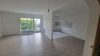 Erdgeschosswohnung mit Gemeinschaftsgarten und Balkon in Witten-Bommern - Wohnbereich mit offener Kü.jpg