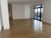 City-Loft im Erdgeschoss mit überdachter Terrasse und Garage - Wohnzimmer Richtung offene.jpg