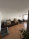 Attraktive 2-Zimmer-Wohnung mit Balkon und guter Anbindung - Wohnzimmer mit Umzugskarto.jpg