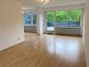 Schicke Eigentumswohnung zur Selbstnutzung mit einer ca. 30 m² großen Dachterrasse - Wohnzimmer Richtung Dachte.jpg