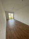 3-Zimmer-Wohnung mit Balkon und Einbauküche in Düsseldorf-Flingern - Helles Wohnzimmer mit Balk.jpg