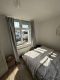 Zentrale 2-Zimmer Wohnung mit idealer Infrastruktur vor der Tür - Schlafzimmer.jpg